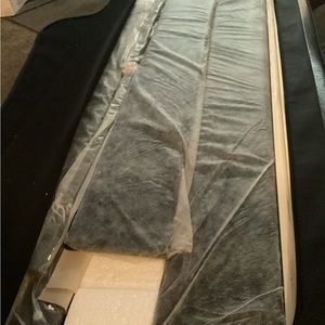 Full size wooden bed frame the head board attached.